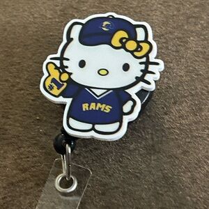 Hello Kitty Rams Phone badge reel- Blue and Yellow